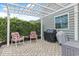 Relaxing outdoor patio area with pergola, grill, and comfortable seating at 419 Broadmoor Dr., Murrells Inlet, SC 29576