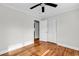 This bedroom features hardwood floors, a ceiling fan, closet, and a neutral paint color at 4320 Stevens St., Loris, SC 29569