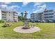 Exterior view featuring well-maintained grounds, picnic table and fire pit at 4350 Intercoastal Dr. # 1404, Little River, SC 29566