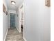 Hallway features wood-look flooring and neutral wall paint at 4350 Intercoastal Dr. # 1404, Little River, SC 29566