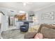 Living room with a partial view of the kitchen, daybed, and cozy seating at 4350 Intercoastal Dr. # 1404, Little River, SC 29566