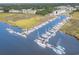Beautiful aerial view of marina with many boats docked on a sunny day at 4350 Intercoastal Dr. # 1404, Little River, SC 29566