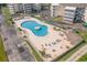 Aerial view of the Intercoastal Village Resort's pool with chairs and tables for relaxation at 4350 Intercoastal Dr. # 1404, Little River, SC 29566