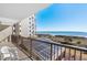 Balcony with ocean view overlooking beach access and outdoor dining/seating at 4719 S Ocean Blvd. # 209, North Myrtle Beach, SC 29582