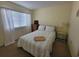 Bright bedroom with a full bed, soft lighting, and a calm atmosphere for restful nights at 4719 S Ocean Blvd. # 209, North Myrtle Beach, SC 29582