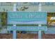A community sign reads 'Sea Winds' at 4719 South Ocean Blvd, showcasing the property's name and location at 4719 S Ocean Blvd. # 209, North Myrtle Beach, SC 29582