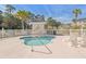 Community pool featuring a smaller whirlpool and ample space for sunbathing at 4803 Bovardia Pl. # 102, Myrtle Beach, SC 29577