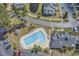 Community pool area featuring a pool, gazebo, and lounge chairs, set amid lush landscaping at 4940 Windsor Green Way # 203, Myrtle Beach, SC 29579