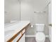 Bathroom featuring a commode, shower, and sink with vanity with ample counter space, neutral paint, and hardware at 4940 Windsor Green Way # 203, Myrtle Beach, SC 29579