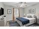 Bedroom featuring hardwood floor, a ceiling fan, and simple decor at 4940 Windsor Green Way # 203, Myrtle Beach, SC 29579