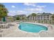 Refreshing community pool with lounge chairs, umbrellas and well maintained pool area at 4940 Windsor Green Way # 203, Myrtle Beach, SC 29579