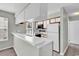 Functional kitchen equipped with ample counter space, classic cabinetry, and essential appliances at 4940 Windsor Green Way # 203, Myrtle Beach, SC 29579