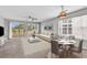 Cozy and inviting living room with ample seating, natural light, and balcony views at 4940 Windsor Green Way # 203, Myrtle Beach, SC 29579