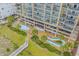 Aerial view featuring a resort with parking garage and swimming pool and lazy river, all with beach access at 501 S Ocean Blvd. # 307, North Myrtle Beach, SC 29582