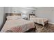 Cozy bedroom with two twin beds, soft lighting, and charming coastal decorations at 501 S Ocean Blvd. # 307, North Myrtle Beach, SC 29582