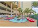 Enjoy splashing in the lazy river with colorful floats for relaxing fun in the sun! at 501 S Ocean Blvd. # 307, North Myrtle Beach, SC 29582