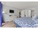 Tastefully decorated bedroom with wood floors, dresser, and ample closet space at 501 S Ocean Blvd. # 307, North Myrtle Beach, SC 29582