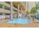 Enjoy the community pool with lounge chairs, surrounded by lush landscaping and the convenience of an on-site parking garage at 501 S Ocean Blvd. # 307, North Myrtle Beach, SC 29582