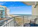 Balcony with ocean views and seating, perfect for relaxing and enjoying the beautiful scenery at 5200 N Ocean Blvd. # 937, Myrtle Beach, SC 29577