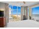 Bedroom with a large window with beach and ocean views at 5200 N Ocean Blvd. # 937, Myrtle Beach, SC 29577
