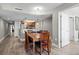 The dining area is adjacent to the kitchen, with a wooden table and views into the living areas at 5200 N Ocean Blvd. # 937, Myrtle Beach, SC 29577