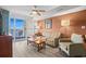 Relaxing living room with modern furnishings and balcony access offering ocean views and plenty of natural light at 5200 N Ocean Blvd. # 937, Myrtle Beach, SC 29577