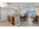 Spacious living space with a breakfast bar, dining area, and a cozy living area with balcony access and ocean views at 5200 N Ocean Blvd. # 937, Myrtle Beach, SC 29577