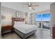 Relaxing main bedroom with ocean views, balcony access, and minimalist decor at 5200 N Ocean Blvd. # 937, Myrtle Beach, SC 29577