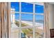 Large window with beach and ocean views and neutral color curtains at 5200 N Ocean Blvd. # 937, Myrtle Beach, SC 29577
