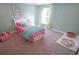 Brightly decorated bedroom with cute decor, soft carpet, and cheerful accents at 539 Slaty Dr., Myrtle Beach, SC 29588