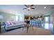 Comfortable living room featuring stylish furniture, ceiling fan, and an open layout with the kitchen at 539 Slaty Dr., Myrtle Beach, SC 29588