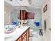 Bright bathroom boasts double sinks, a large mirror, and a glass-enclosed shower at 540 Alderly Ct., Little River, SC 29566