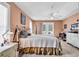 Comfortable bedroom with a metal bed frame, soft lighting, and neutral decor at 540 Alderly Ct., Little River, SC 29566