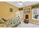 Comfortable bedroom featuring natural light from windows with a ceiling fan at 540 Alderly Ct., Little River, SC 29566