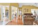 Open-concept living room with hardwood floors, seamlessly connecting to dining area at 540 Alderly Ct., Little River, SC 29566
