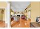 Inviting open-concept living room features hardwood floors and a cozy fireplace at 540 Alderly Ct., Little River, SC 29566