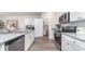 Modern kitchen with granite countertops, stainless steel appliances, and pantry at 559 Firouz Dr, Longs, SC 29568