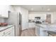 Kitchen with stainless steel appliances, granite countertops, kitchen island and white cabinets at 559 Firouz Dr, Longs, SC 29568
