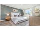This main bedroom offers an accent wall and a window with natural light for a peaceful retreat at 559 Firouz Dr, Longs, SC 29568