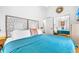 Well-lit bedroom showcasing a king bed, patterned headboard and accent pillows at 6001 - T33 South Kings Hwy., Myrtle Beach, SC 29575