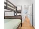 Bedroom with bunk beds and an open view to the hallway and another bedroom at 6001 - T33 South Kings Hwy., Myrtle Beach, SC 29575