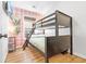 Bright bedroom with a bunk bed and accent wall with plaid wallpaper at 6001 - T33 South Kings Hwy., Myrtle Beach, SC 29575