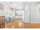 Charming kitchen features a breakfast nook, white cabinetry, stainless steel appliances, and modern decor at 6001 - T33 South Kings Hwy., Myrtle Beach, SC 29575