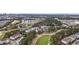 Great view of property and community with golf course, trees, and other homes from an aerial view at 6015 Catalina Dr. # 914, North Myrtle Beach, SC 29582