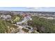 Aerial view of community, showcasing the lush greenery, nearby golf course, and tranquil ponds at 6015 Catalina Dr. # 914, North Myrtle Beach, SC 29582