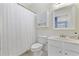 Well-lit bathroom with white fixtures and a combination shower and tub at 6015 Catalina Dr. # 914, North Myrtle Beach, SC 29582