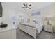 Bright bedroom with neutral walls, a large window, and a comfortable bed at 6015 Catalina Dr. # 914, North Myrtle Beach, SC 29582