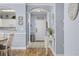 Charming hallway with archways leading to dining room, kitchen, and front door at 6015 Catalina Dr. # 914, North Myrtle Beach, SC 29582