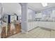 Open-concept kitchen featuring white cabinets, granite countertops, and modern appliances at 6015 Catalina Dr. # 914, North Myrtle Beach, SC 29582