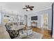 Spacious living room with wood floors, ceiling fan, and open access to other rooms at 6015 Catalina Dr. # 914, North Myrtle Beach, SC 29582